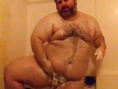 Chubby man in the shower